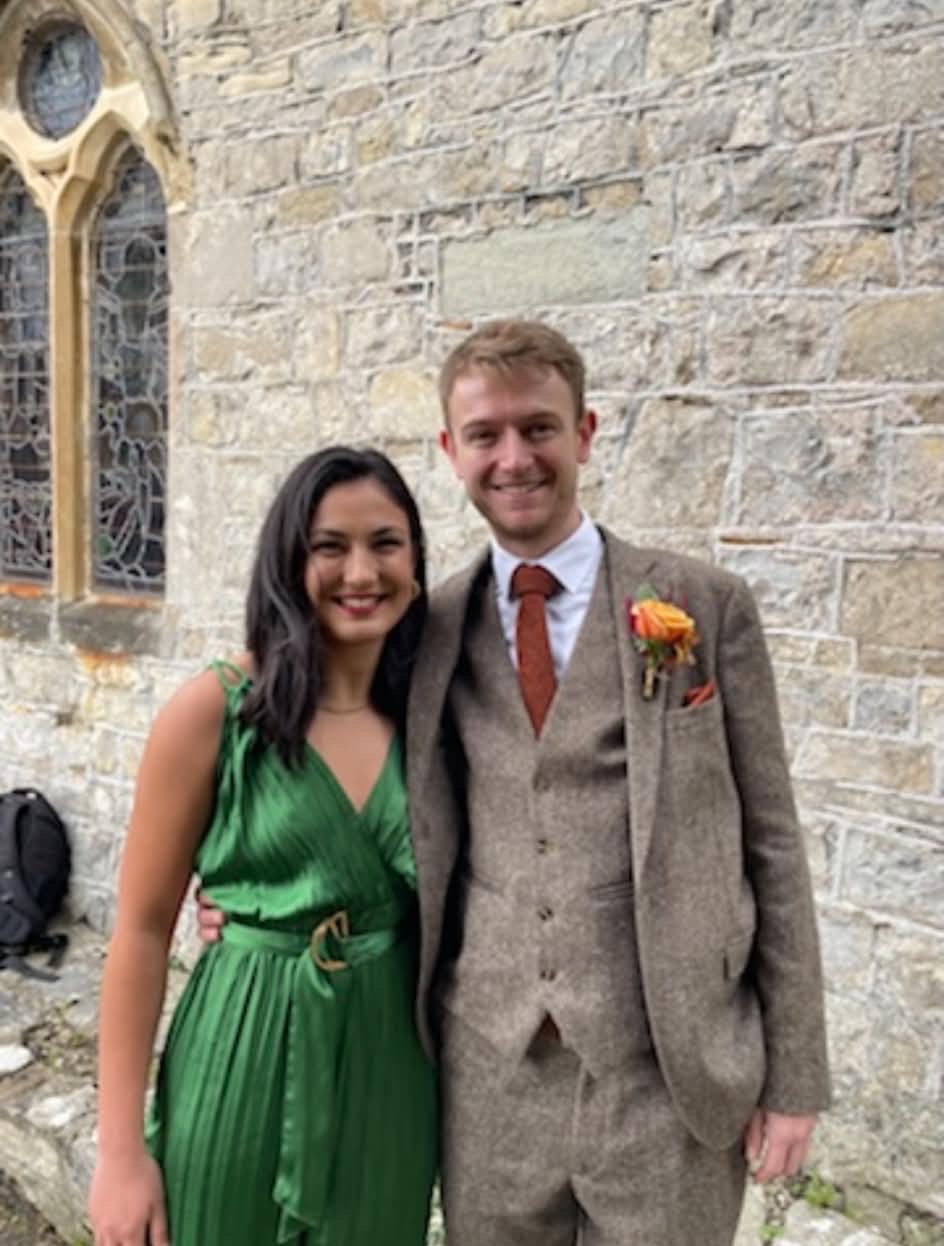 Luisa and Tom outside a church